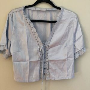 Baby blue tie top with lace detail